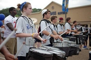 Mary Elizabeth Ballard, 15, plays the tenors with other members of the Warren Central Big Blue Band drumline Saturday morning during the 16th annual City Wide Pep Rally at the Outlets of Vicksburg. (Justin Sellers/The Vicksburg Post)