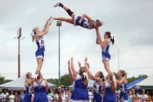 PCA cheerleaders perform an aerial stunt Saturday morning during the 16th annual City Wide Pep Rally at the Outlets of Vicksburg. (Justin Sellers/The Vicksburg Post)