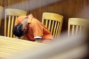 Kenjarvis Thomas bows his head while Judge Isadore Patrick sentences Rodrigues Lyons and Tierre Hill to 60 years in prison apiece Friday morning in Warren County Circuit Court for two counts of attempted murder. Thomas received 20 years for two counts of armed robbery. (Justin Sellers/The Vicksburg Post)