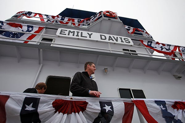 CHRISTENED: Visitors tour the M/V Emily Davis before the boat’s christening Tuesday morning at Magnolia Marine Transport.