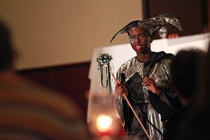 Miesha Bure, playing the role of Jester, performs a monologue Friday night during the Vicksburg High School Choral Department's presentation of Singe Feaste at the Southern Cultural Heritage Center. (Justin Sellers/The Vicksburg Post)
