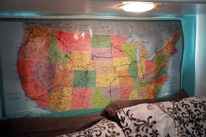 A map showing the route documentary makers Alyssa and Heath Padgett have taken on their seven-month-long trip filming "Hourly America" hangs above the bed in their RV. (Justin Sellers/The Vicksburg Post)