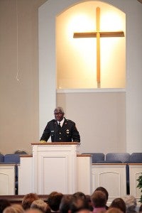 Vicksburg Fire Department Chief Charles Atkins speaks Wednesday to more than 200 people who attended the funeral of Lt. Drue Randolph Wednesday at Immanuel Baptist Church. (Justin Sellers/The Vicksburg Post)