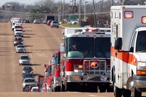 Dozens of emergency and law enforcement vehicles line Clay Street Wednesday during a funeral procession for Vicksburg Fire Department Lt. Drue Randolph. (Justin Sellers/The Vicksburg Post)