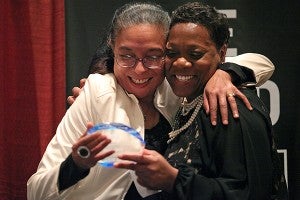 HONORED: Heidi Burrell, left, presents Sylvia Hall with the Campaign Coordinator of the Year award Thursday.