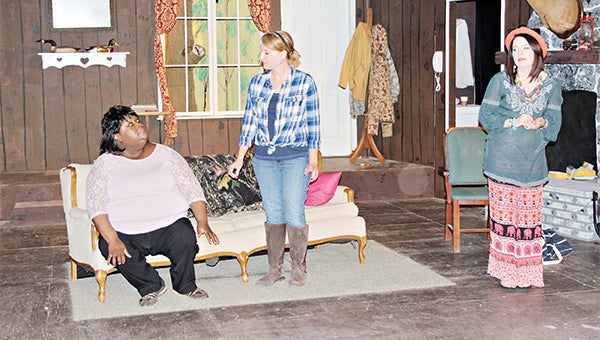 DEBUTING: Cathy Sanford, left, Stacie Schrader and Caroline Gent rehearse their roles for the Westside Theatre’s upcoming production of “Chance of a Ghost.” The two-act play opens at 7:30 p.m. Friday at the Strand Theatre. Shows will continues Saturday and March 13 and 14.