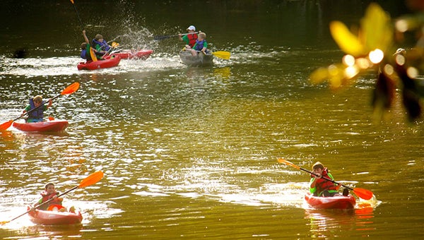 GETAWAY: Campers paddle at the YMCA's annual Warner-Tully Camp in Claiborne County.