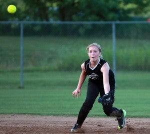 Sheriff Martin Pace's Brooklyn Hart reaches to catch a ball against Carpet One Wednesday at Bazinsky Park. (Justin Sellers/The Vicksburg Post)