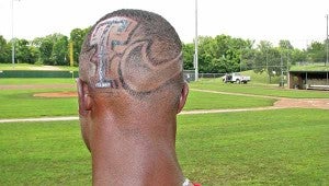 Former Vicksburg High star Clyde Kendrick shows off his new haircut, which features logos for the Texas Rangers and Nike. Kendrick was selected by the Texas Rangers in the 27th round of the Major League Baseball draft earlier this month. 