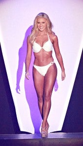 Miss Riverland Laura Lee Lewis, left, won Thursday night’s swimsuit preliminary competition for the Miss Mississippi Pageant.
