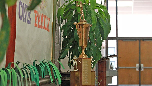 The Virgadamo Award, given annually to a top player and team leader on St. Aloysius’ football team, sits in the school’s lobby on Wednesday. The award is named for Anthony Virgadamo, a former student who was killed in the Korean War. (Ernest Bowker/The Vicksburg Post)