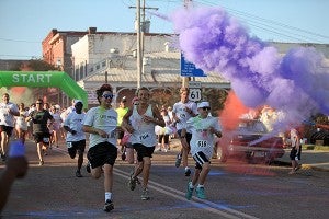 Runners take off from the starting line Saturday morning during the United Way of West Central Mississippi's inaugural True Color Run. (Justin Sellers/The Vicksburg Post)