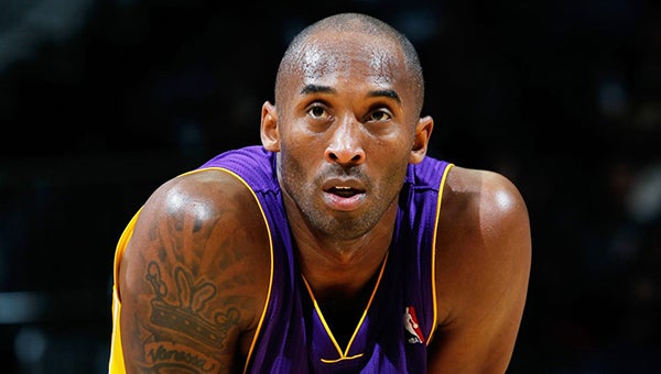 Kobe Bryant of the Los Angeles Lakers bites his jersey while playing  News Photo - Getty Images